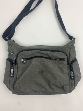 Kipling Olive Green Nylon Crossbody Messenger Bag Black Strap Multiple pockets